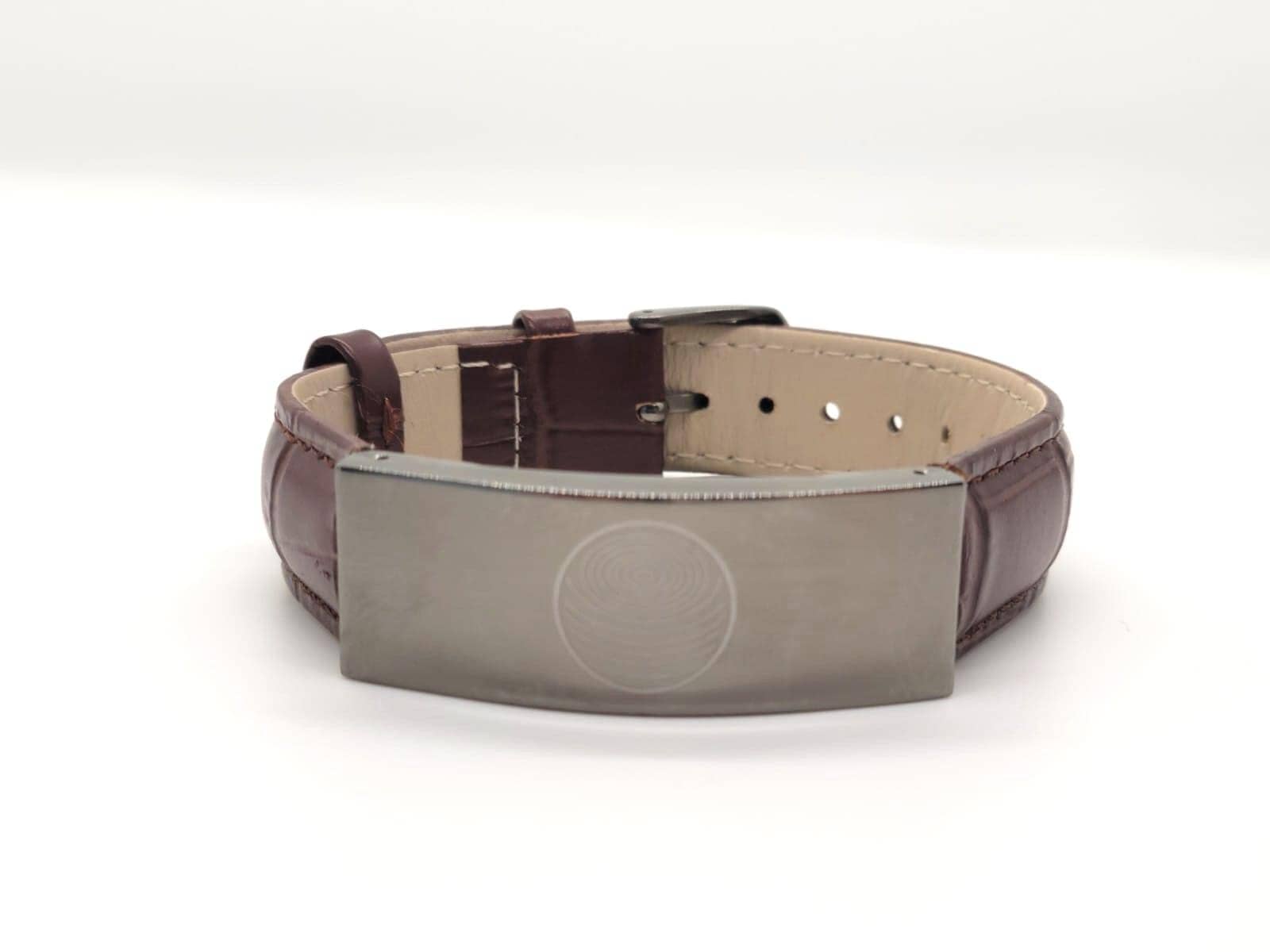Brown leather belt with a silver buckle on a white background